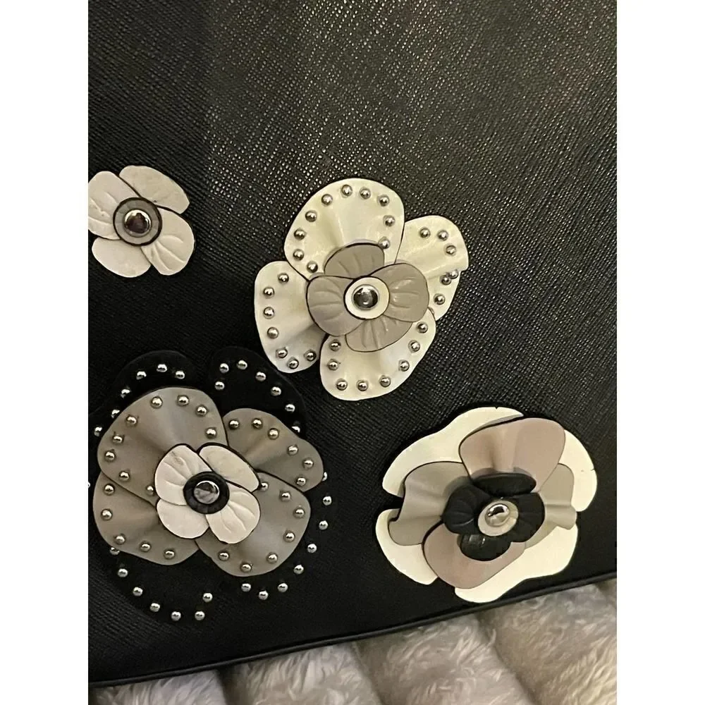 Black leather MIchael Kors emmy lg backpackw/tea flower roses